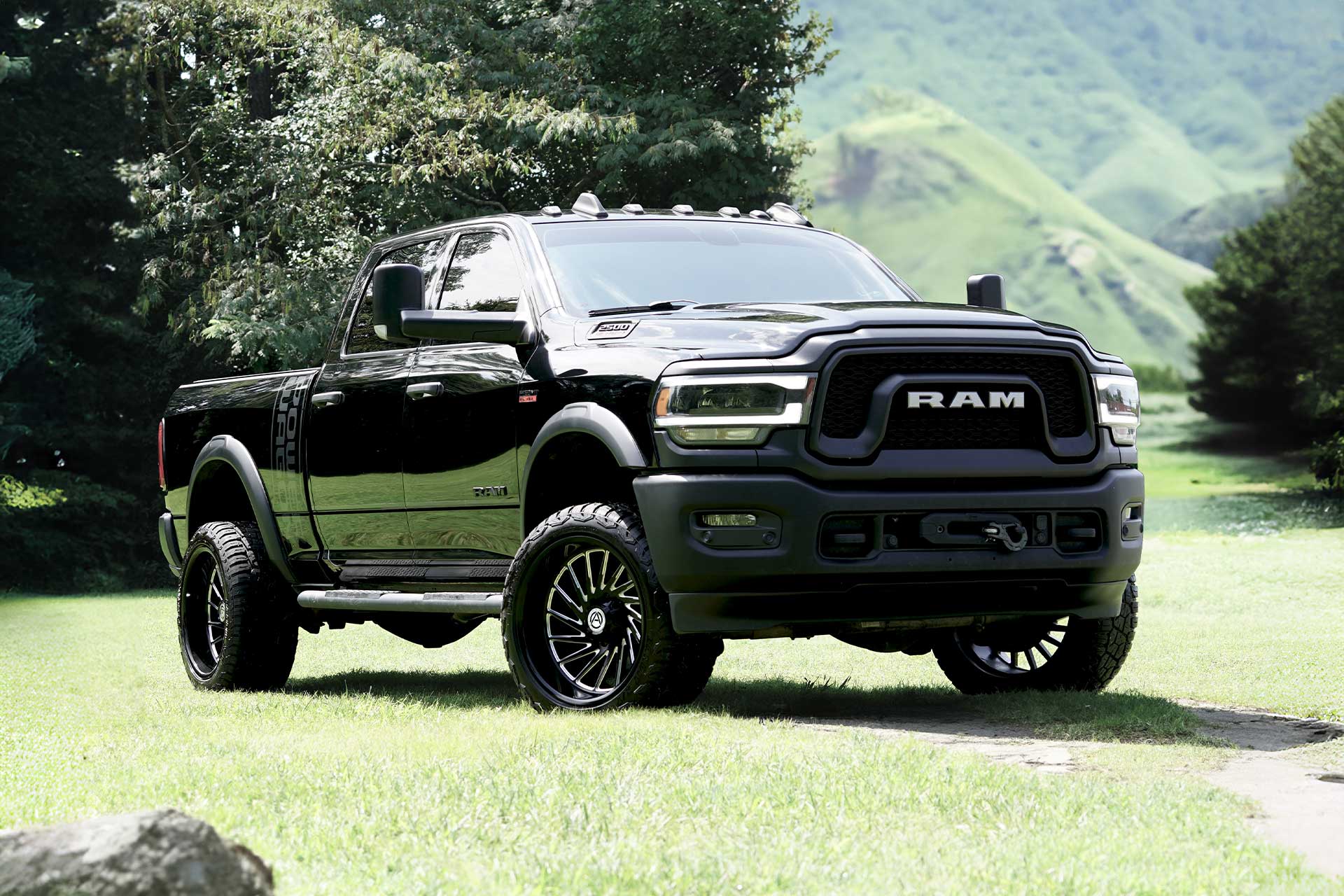 black dodge ram 2500 with gloss black milled artem off road a205 curvus wheels