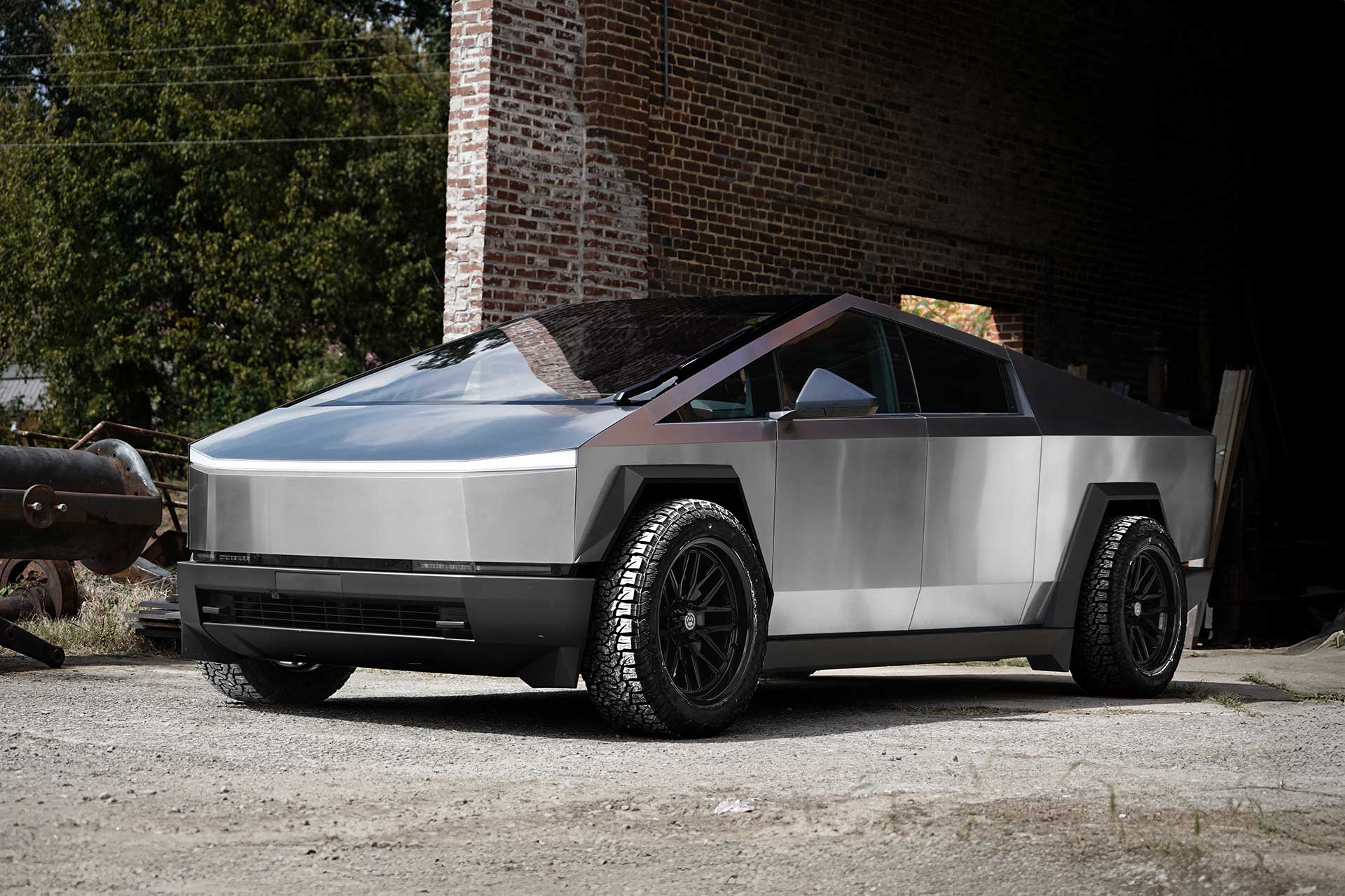 steel finish tesla cybertruck with gloss black artem off road a207 kosmos wheels