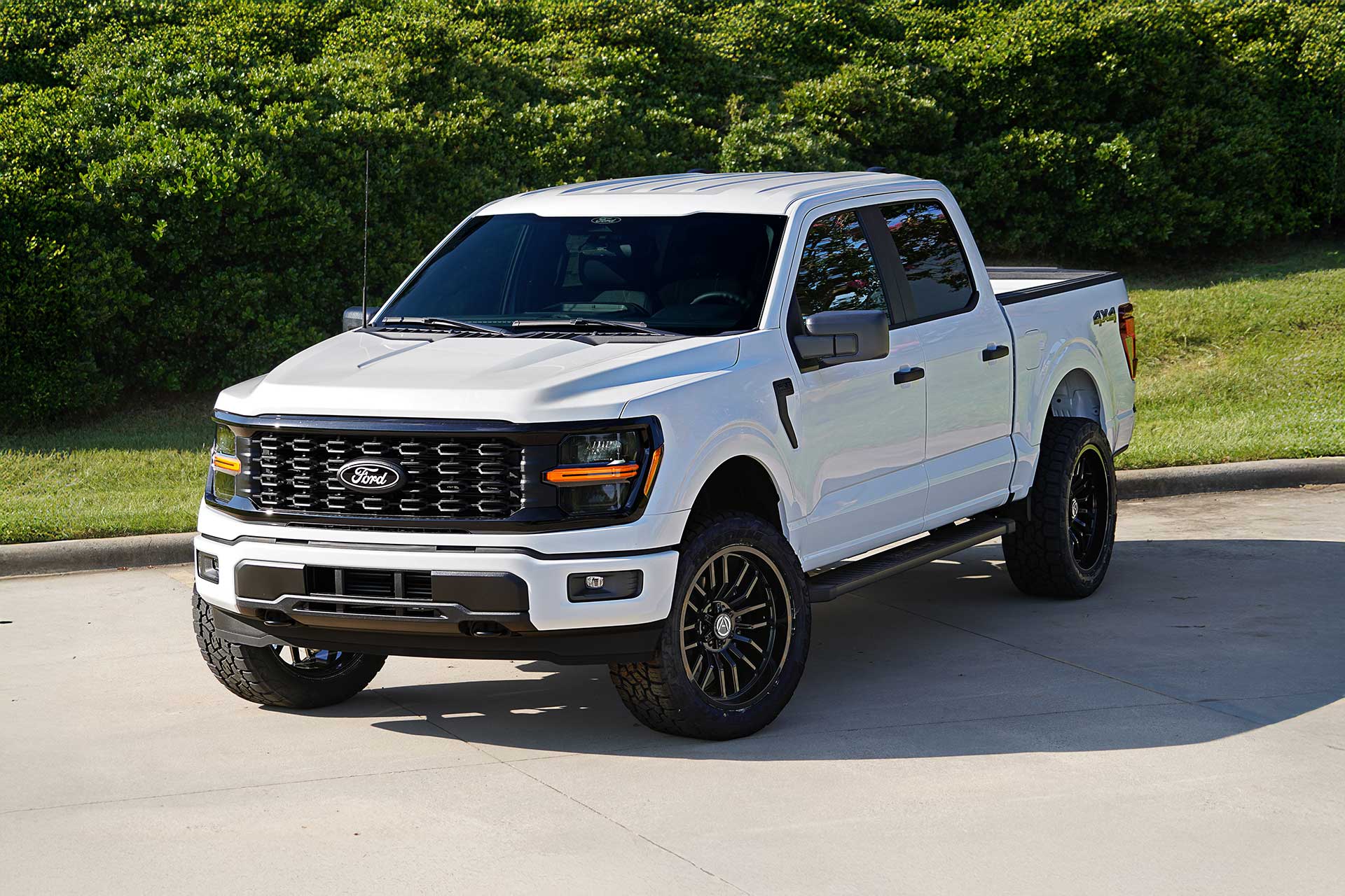 artem off road cast wheels on white ford f150