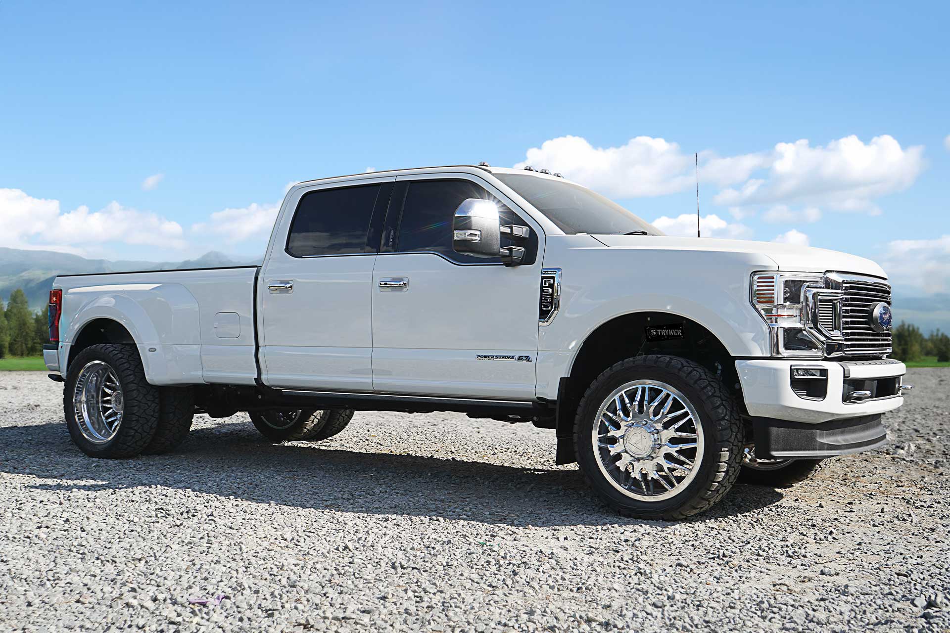 white ford f350 with polished artem off road af01 novus dually wheels